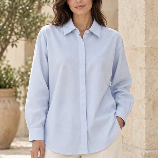 Camisa oversize de algodón con tapeta oculta